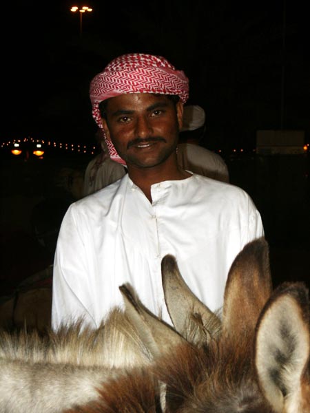 Man with donkey