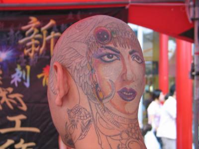 Xiao Wei head tatt