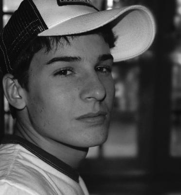 u38/ccvii/medium/31966008.DSC_2777boytomaninthebeatofaheartblink72dpicroppedmaxpostedandbw.jpg