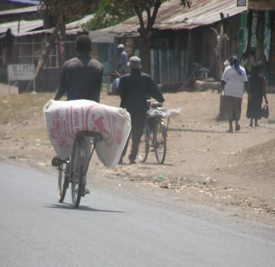 Many bikes are piled much higher with stuff