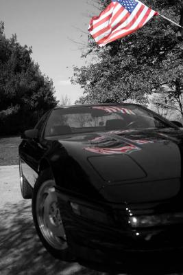 Corvette with flag reflection