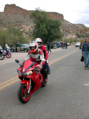Red Yamaha and color-matched riders