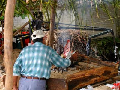 Restaurant owner makeshifts grill to continue business