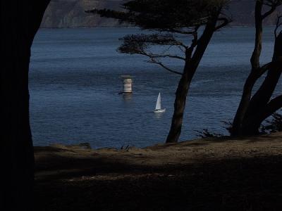 Lighthouse and Sail Boat