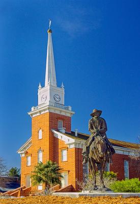Old Tabernacle With Cowboy Statue