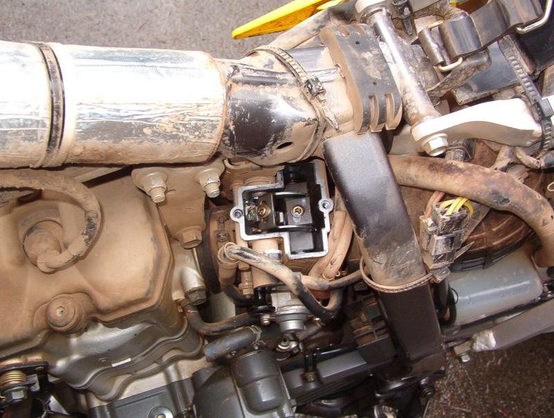 Carburetor top removed to access needle.