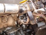 Carburetor top removed to access needle.
