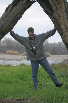 Larry holding up some logs! Hee Hee