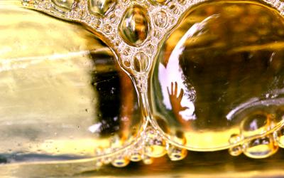 IMG_5619--hand reflected in bottle bubbles.jpg