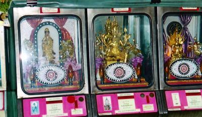 Bangkok Temple of the Golden Buddha slots.JPG