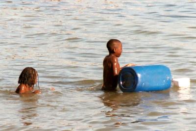 Children Swiming Off the Coast of Honduras