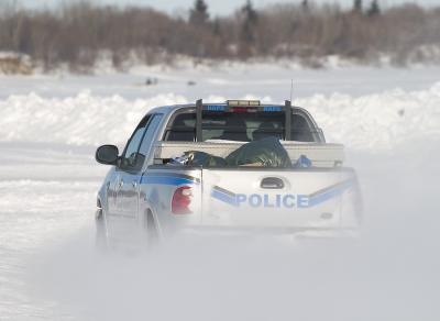 Nishnawbe Aski Police Services vehicle on the Moose River