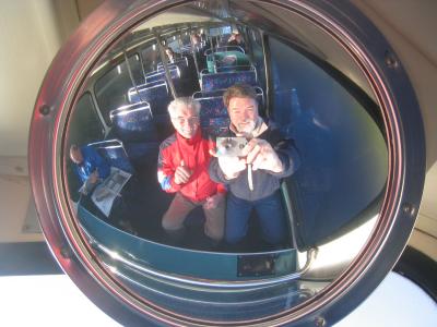 Dad & me on bus thru mirror