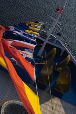 signal flags and prop blades at the bow