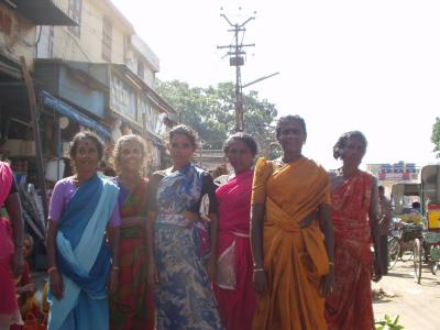 Marketwomen all got up for a pose