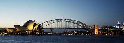 Sydney Oprahouse and Harbor bridge at sunset