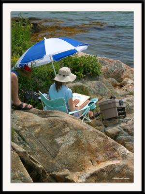 An artist at work at Porpoise Harbor, Maine.