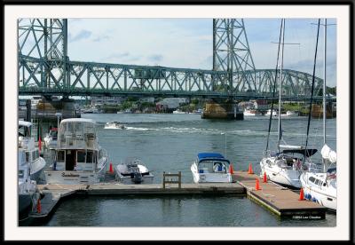 Portsmouth Harbor, New Hampshire. The bridge pictured spans Portsmouth and Kittery, Maine.