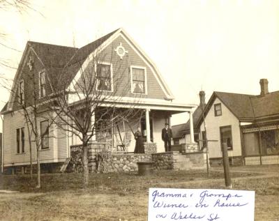 1875 - Gramma and Grampa Wisner i house on Welles Street.jpg