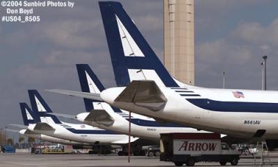 Arrow Air DC8-63F N661AV, DC8-62F N8969U, DC8-62F N810BN, and DC8-62F(AF) N791AL cargo airline aviation stock photo #8505