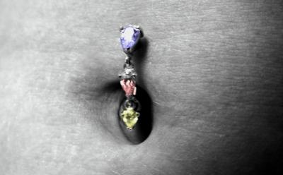 Steffi's Belly Ring.
P.S. I used Photoshop 7.0 to add the colour to the jewles. They are normaly white crystals.