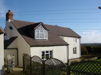 u39/anmb1/medium/25522972.06Rearsideviewofhousefromstablesarea.jpg