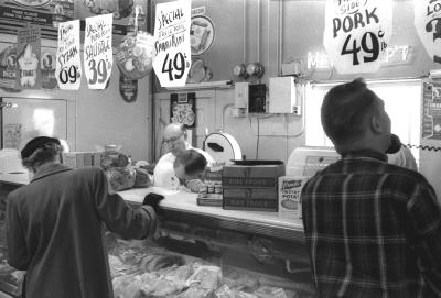 Dad Grupp Behind Counter - Note Prices