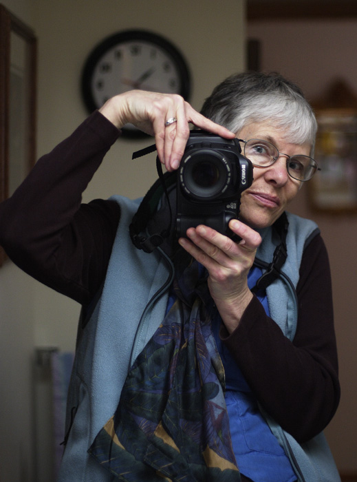 <B>Photographer at Work</B><BR>*<FONT size=2>Ann Chaikin</FONT>