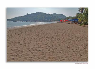 A bright & Hazy, hot & steamy day on the beach taken just in front of the restaurant row.  Well, time to get back to my Coco frio!