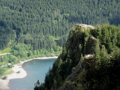 Hiker Standing on Lower Ledge