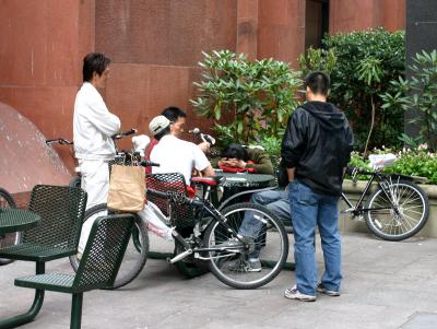 Chinese Restaurant Food Deliverers Taking a Break