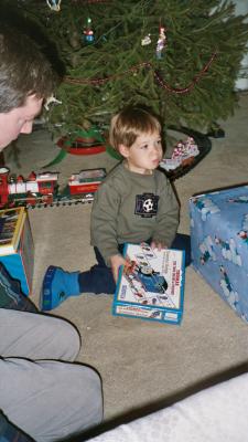 Ben opening presents at his Tita Caroline's house in Watchung, NJ