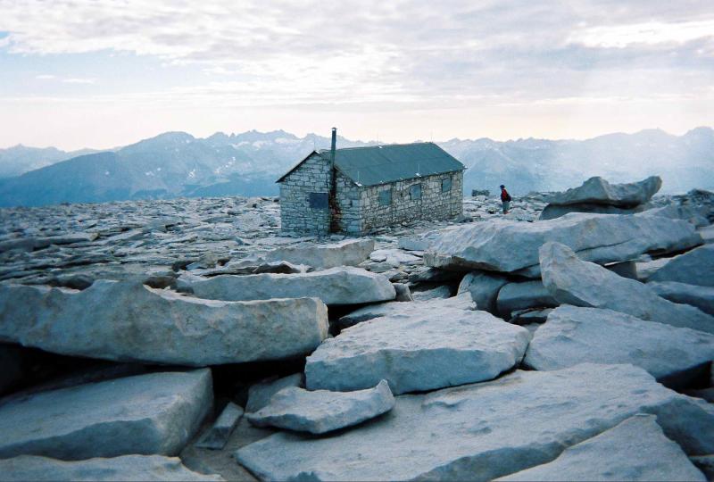Survival hut on the summit holds the names of those who have been here. The chimney stands over 14,500 feet high