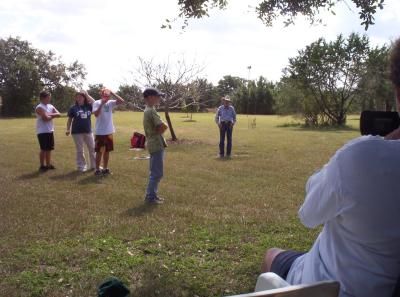 Then he pulled out the 4 more-grown kids from our crowd and used them one-at-a-time to perform a different rope trick on each and then as a group.