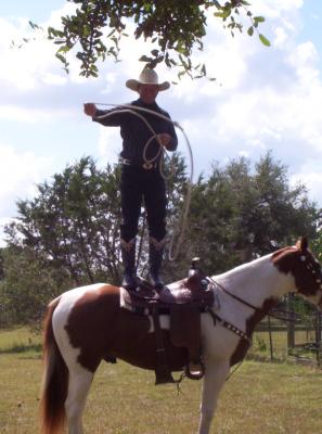 He only stood on his horse's saddle for about 10 minutes - straight, while still performing yet more and more roping tricks to our delight.