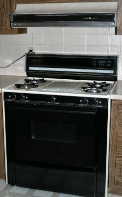 Stove & Hood with Griddle covered