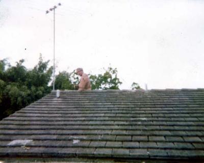 Dad on the Roof fixing the TV reception Nov. 1975 (no cable in those days)