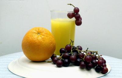 Orange. Grapes and Juice by:Pat  Liu
