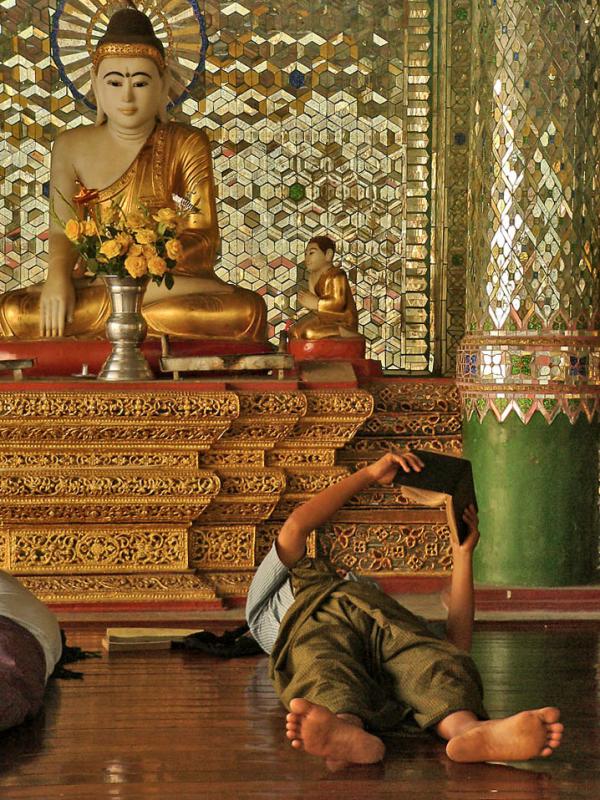 Reading with Buddha, Yangon, Myanmar, 2005