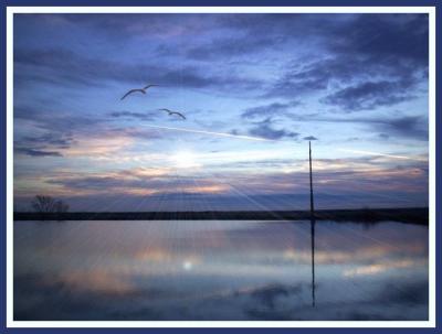 Sapphire Sunrise Over The Water