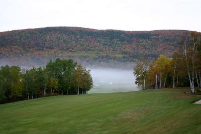 Morning fog at bottom of golf course