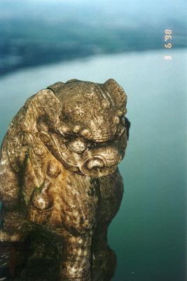 kunming dragon gate lion figurine
