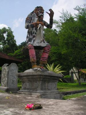 Statue with offering