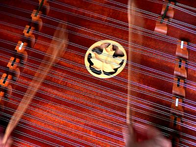 Hammering the Dulcimer by lighttoart