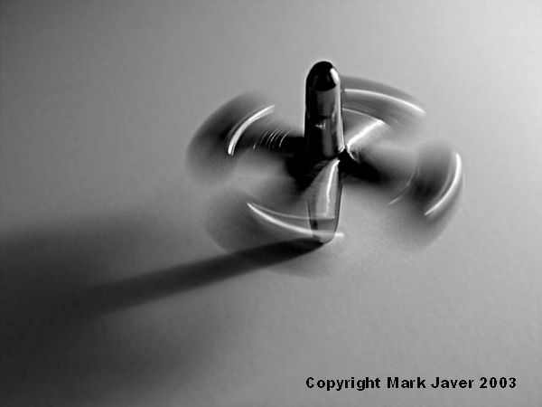 <b>Sixth<br><br>Spinning In Time</b> <br> <font size=3>by Mark J</font>