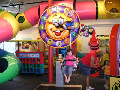 Sarah and another ride at  Chuck E. Cheese's