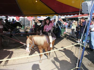 Sarah riding pony at the Bloomsburg Fair