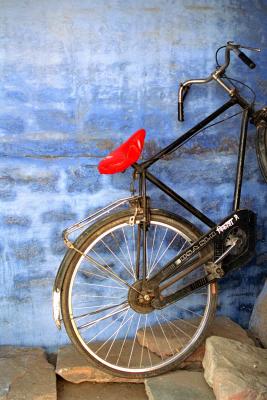 bicycle against blue wall.jpg
