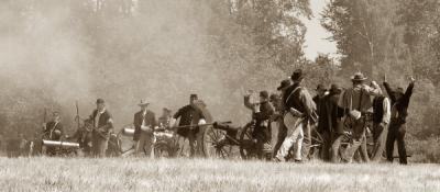 Small Confederate group capturing the guns