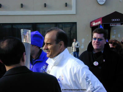 Joe Torre talks to the press about the Olympic Torch